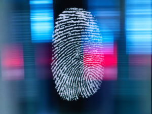 Finger print on digital screen being scanned Finger print on digital screen being scanned